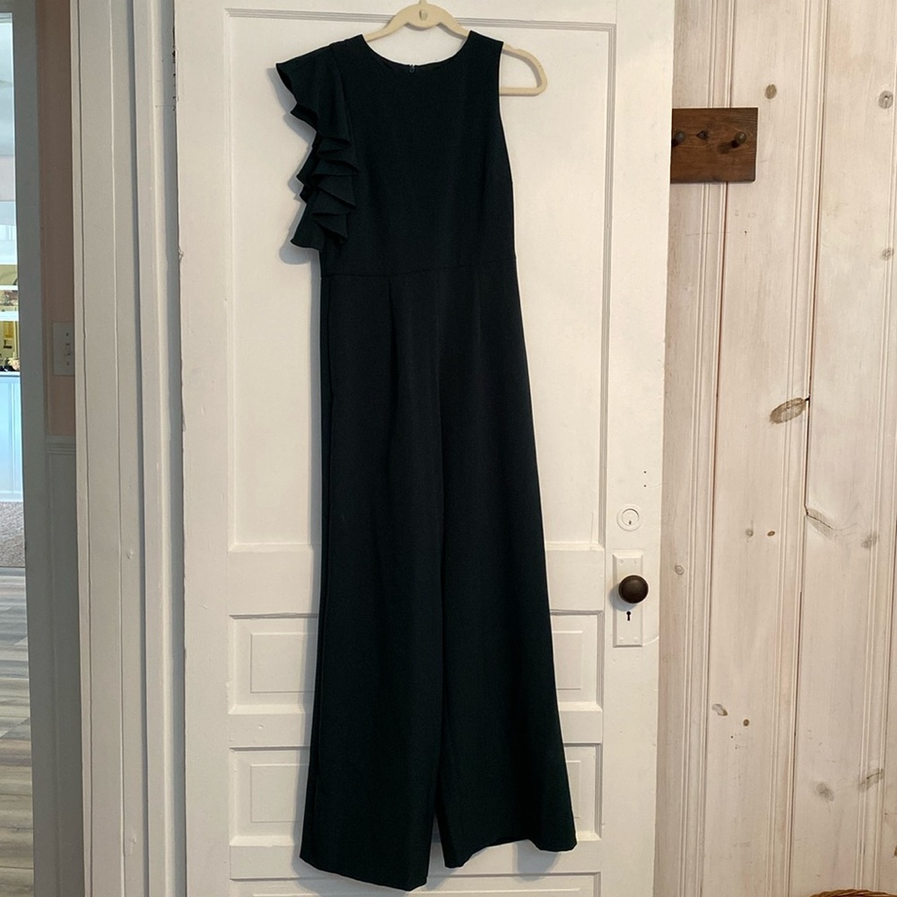 Julia Jordan dark green jumpsuit with wide legs and a ruffle